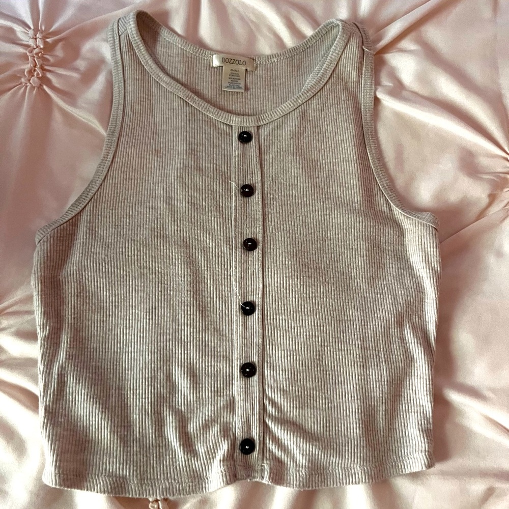 Beige tank top.
